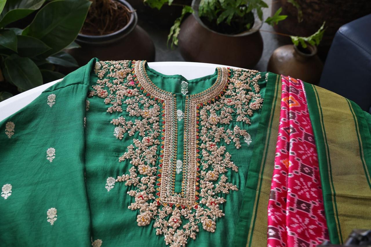 Sandhya Reddy - Bottle Green Pure Banarasi Silk Semi-Stitched Suit Set with Dabka, Dori and Zardozi Work with Contrast Rani Pink Handwoven Ikkat Dupatta