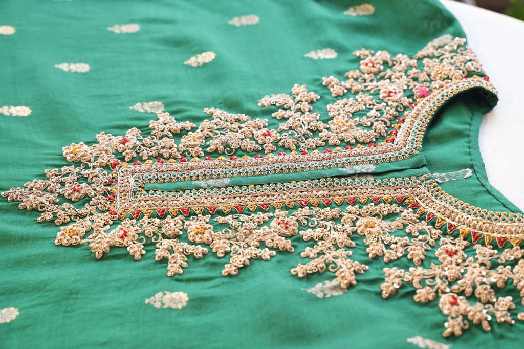 Sandhya Reddy - Bottle Green Pure Banarasi Silk Semi-Stitched Suit Set with Dabka, Dori and Zardozi Work with Contrast Rani Pink Handwoven Ikkat Dupatta